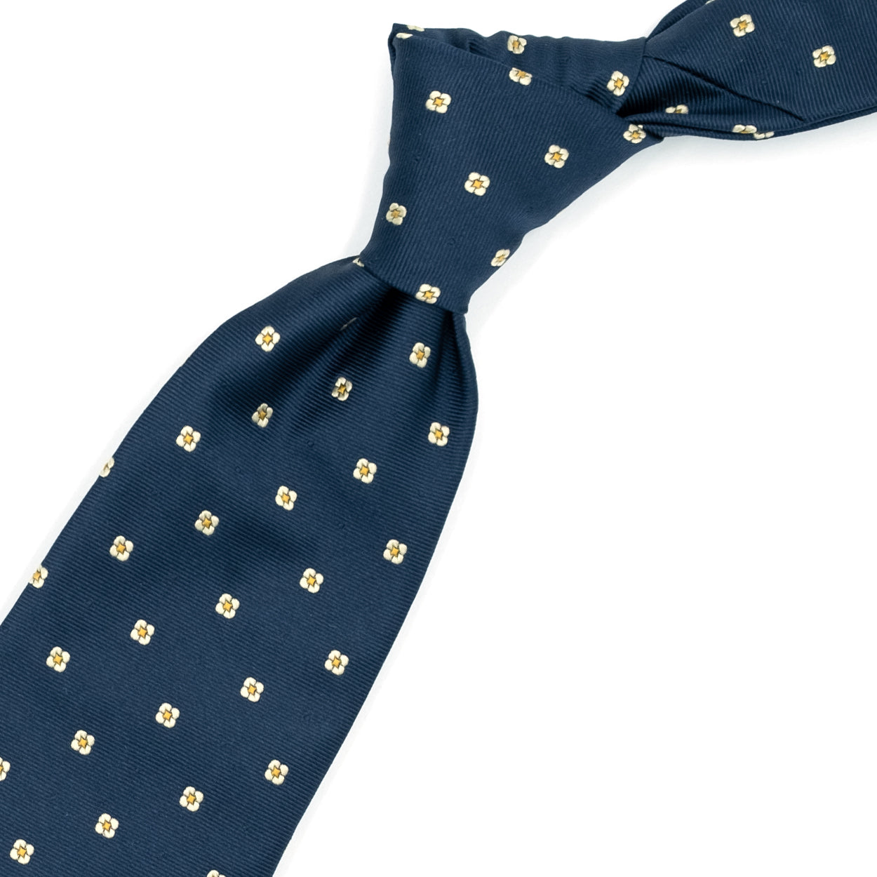 Blue tie with gray flowers and yellow dots