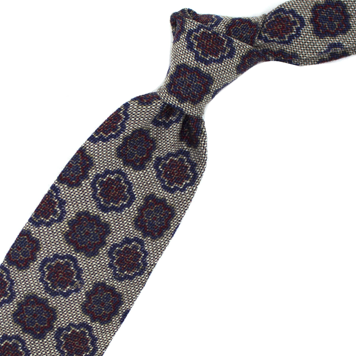 Beige tie with blue and burgundy medallions