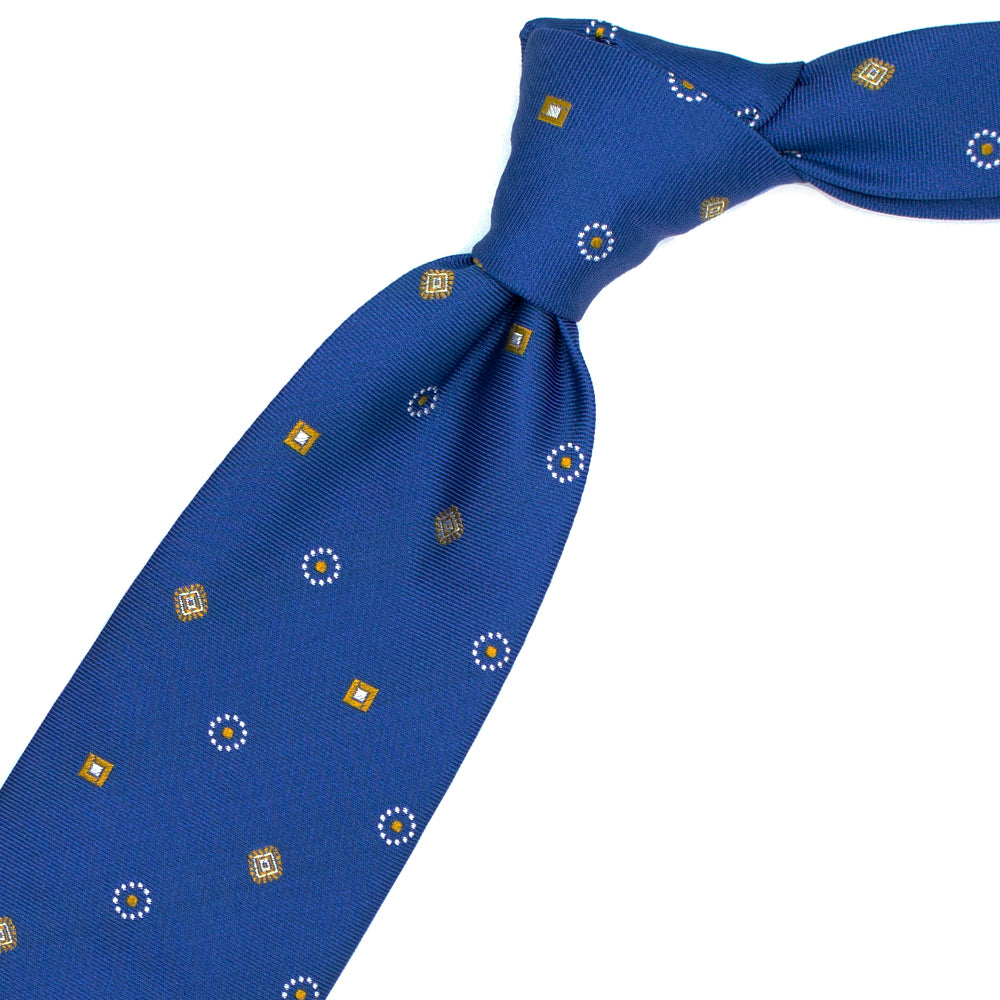 Blue tie with yellow and white geometric pattern