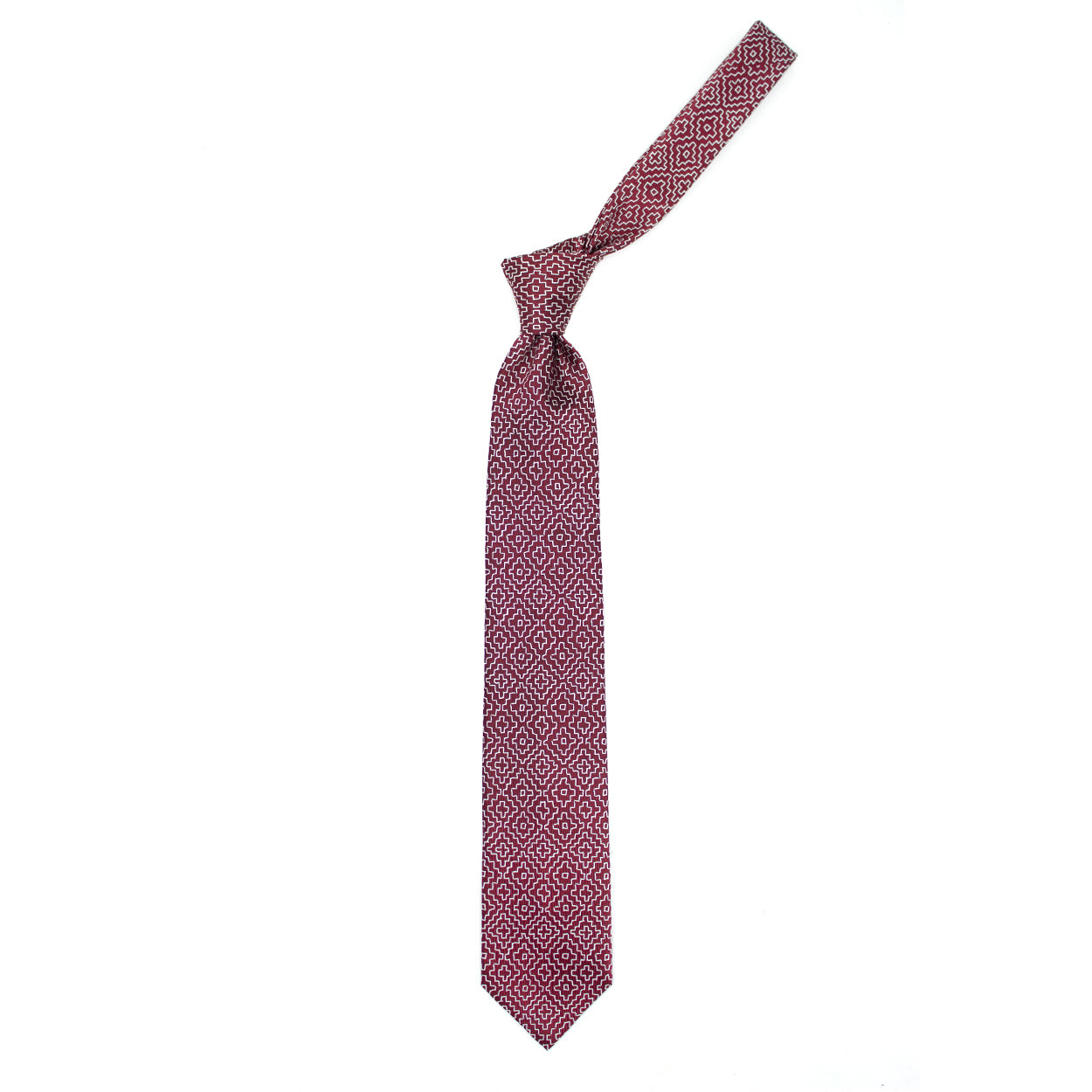 Red tie with white geometric pattern