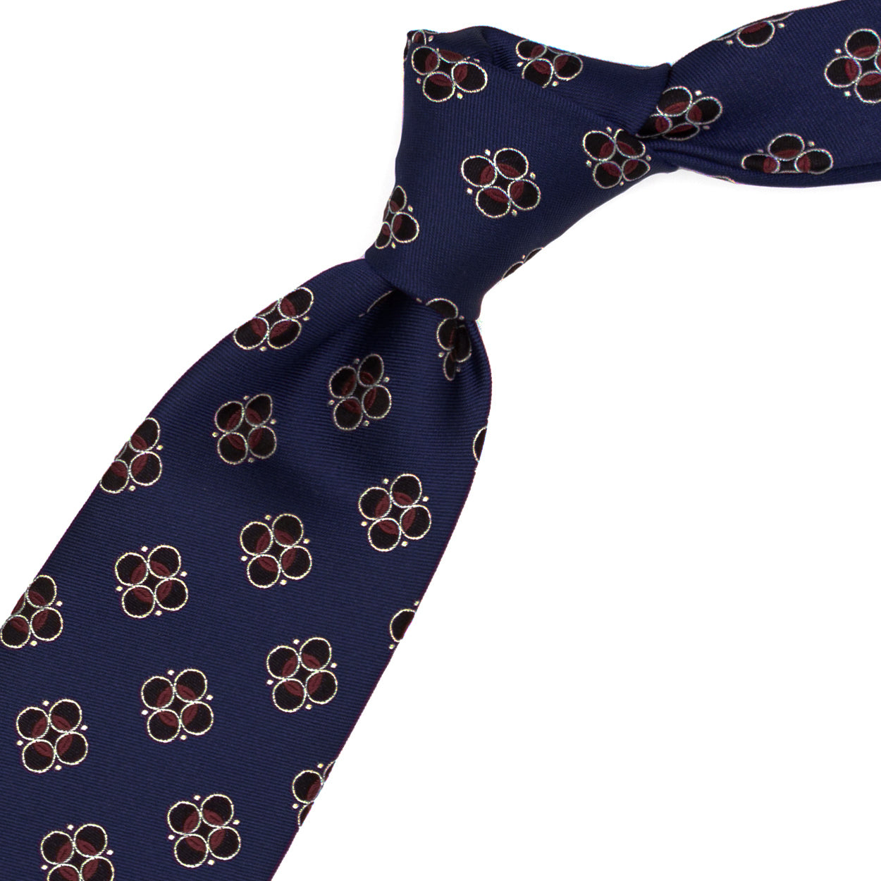 Blue tie with black, white and burgundy pattern