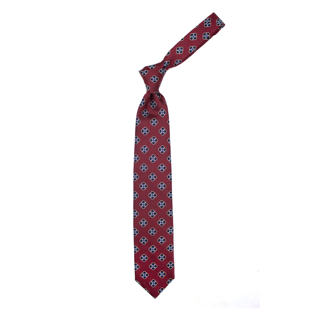 Red tie with blue, light blue and grey geometric pattern