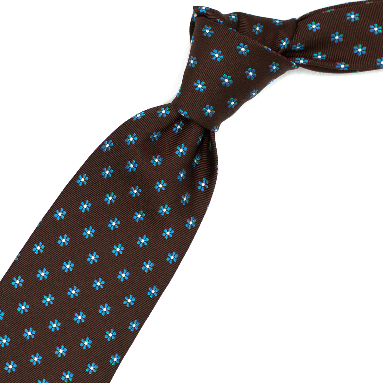 Brown tie with blue flowers and white dots