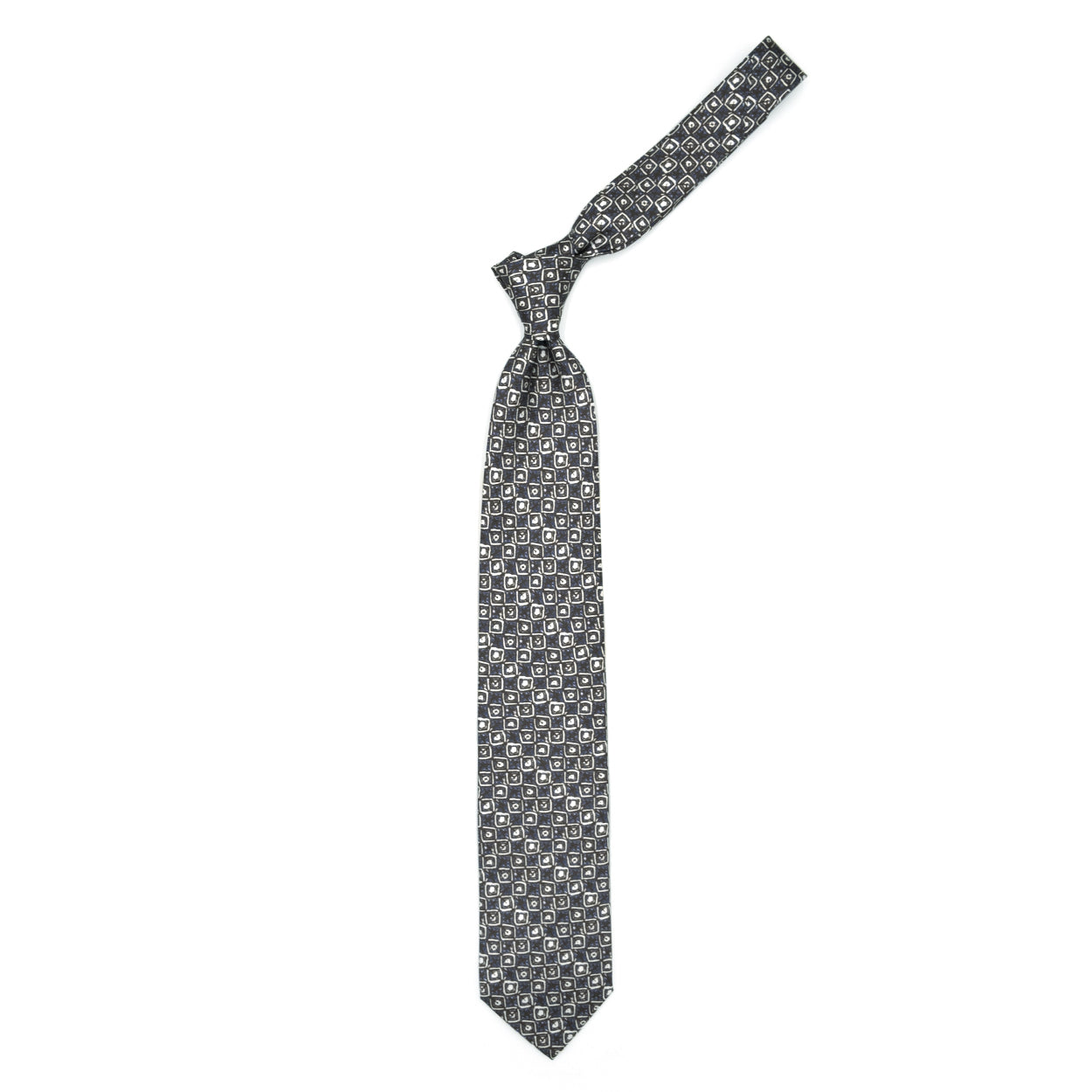 Brown tie with white and blue abstract pattern