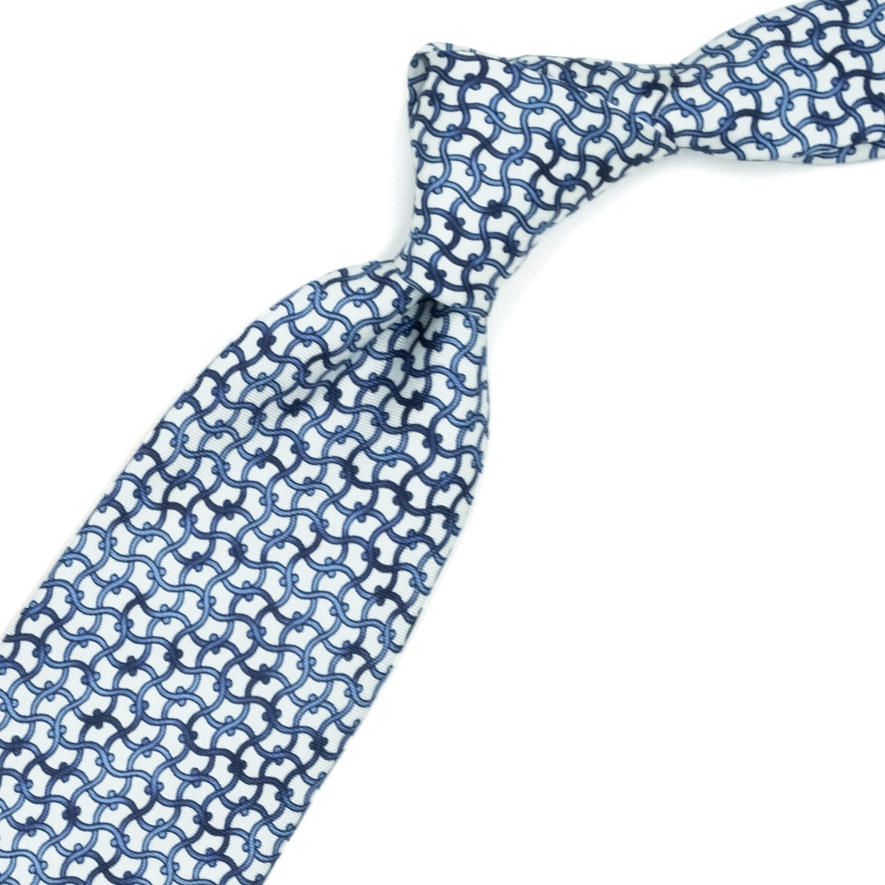 White tie with light blue and blue abstract pattern