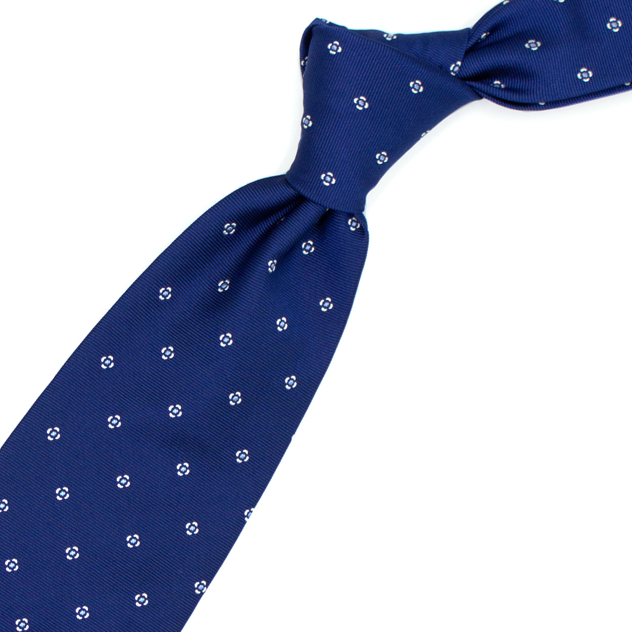 Blue tie with white flowers and blue dots